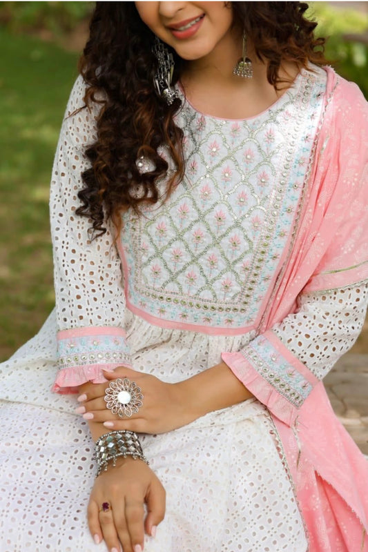 A Cotton Nyra cut kurti with lining embroidery & gota lace.