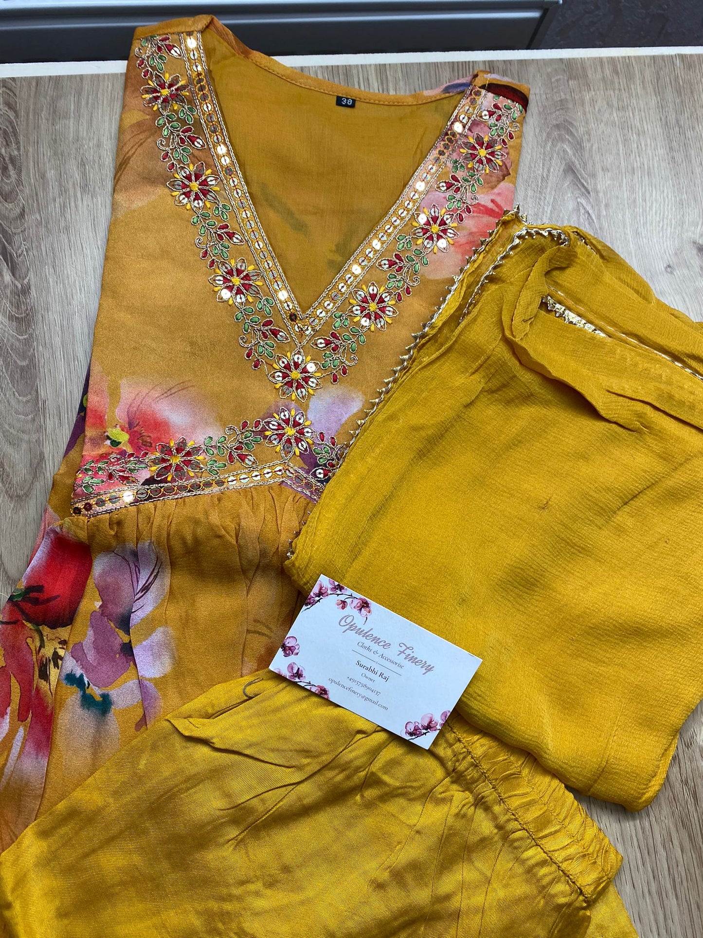 Alluring Yellow Alia Cut Kurti Dupatta and Pants set with mirror hand embroidery.